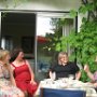 Ann Chamieck, Barbara Johnson, Therese Koturbash and Graham Gillman on Barbara Paskins's patio. June 2009.