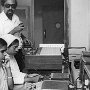 Father Jesurajan in our Radio Studio where Telugu programmes were prepared for broadcast to Andhra Pradesh from Radio Manila. Here are two new persons in training.