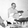 Myself presiding at the weekly Eucharist. Executive Director Raymond Ambrose is sitting on my right. Notice the shawls which were used as Eucharistic vestments.