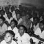 Village boys studying in a typical boarding school at their parish headquarters.