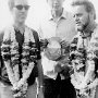 Mr Ferdinand Luthiger of Swiss Lenten Fund (left) and Dr Willi Dober, expert on business mangement (right) flanking me. They have been garlanded at arrival in a parish.