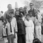 Dr Willi Dober (left) and Mr Ferdinand Luthiger (right) pose with the actors and actresses after a stageplay put on by children of the village. I am in cassock totally on the right.