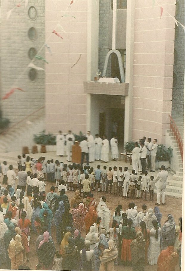 Me presiding over a function for people from the local parish in front of our college chapel.