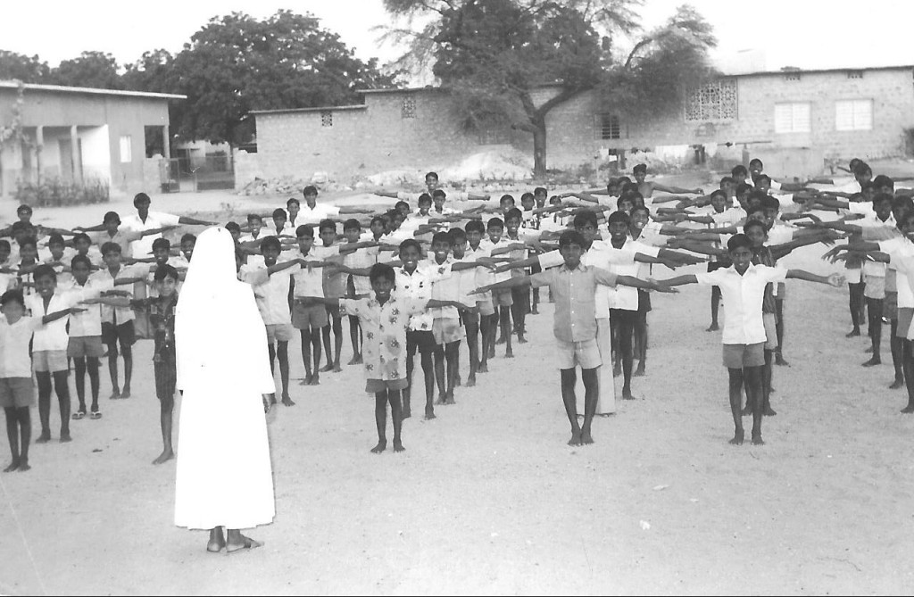 Boys of a larger boarding school doing their morning PT.